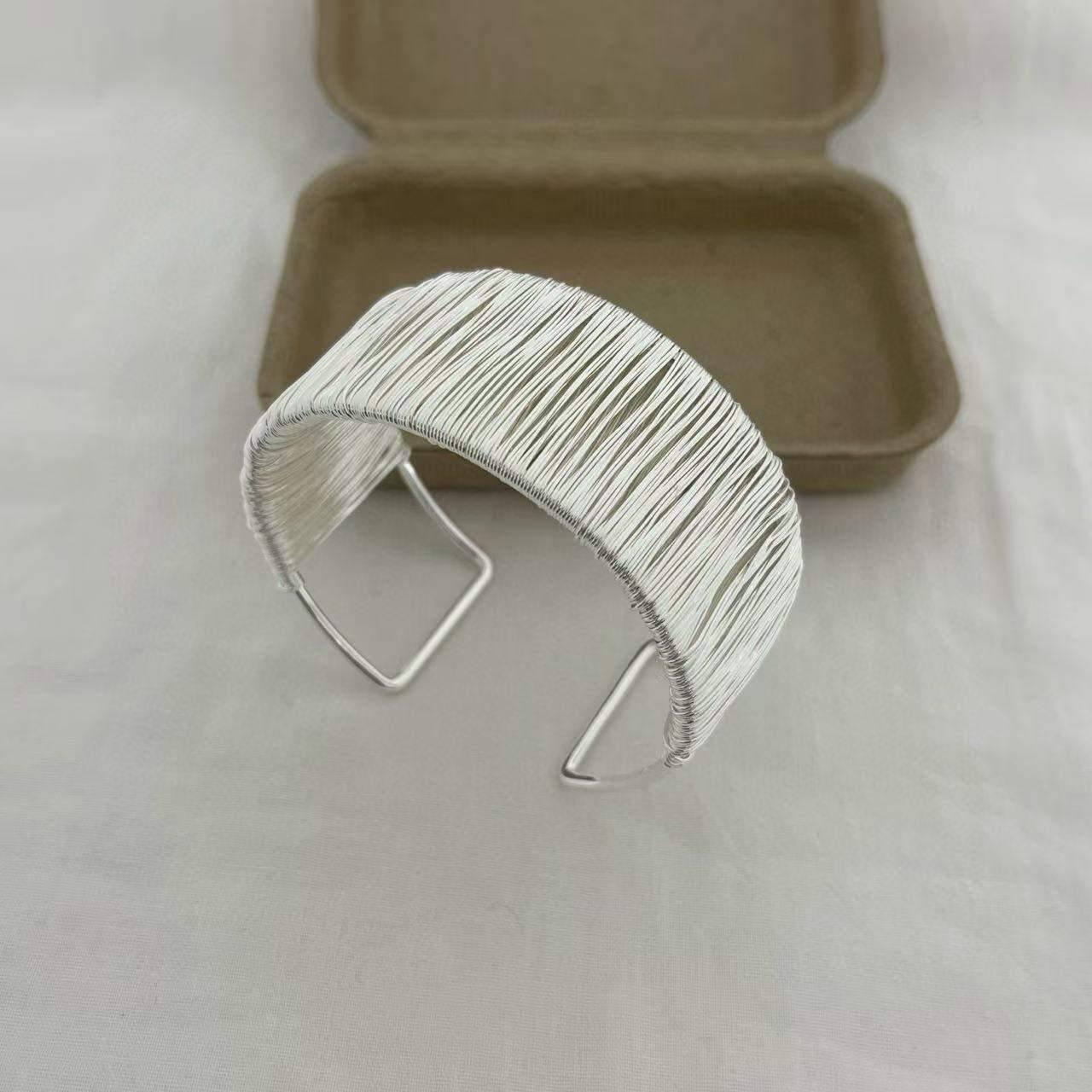 Cuff Bracelet With a Wire-Wrapped Design