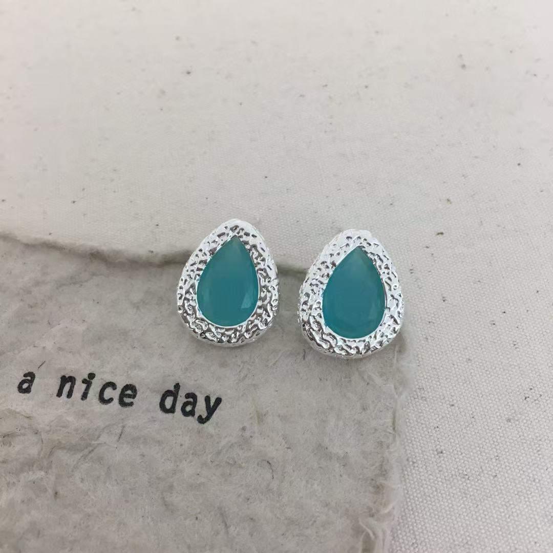 Elegant Teardrop Earrings With Bezel Detail